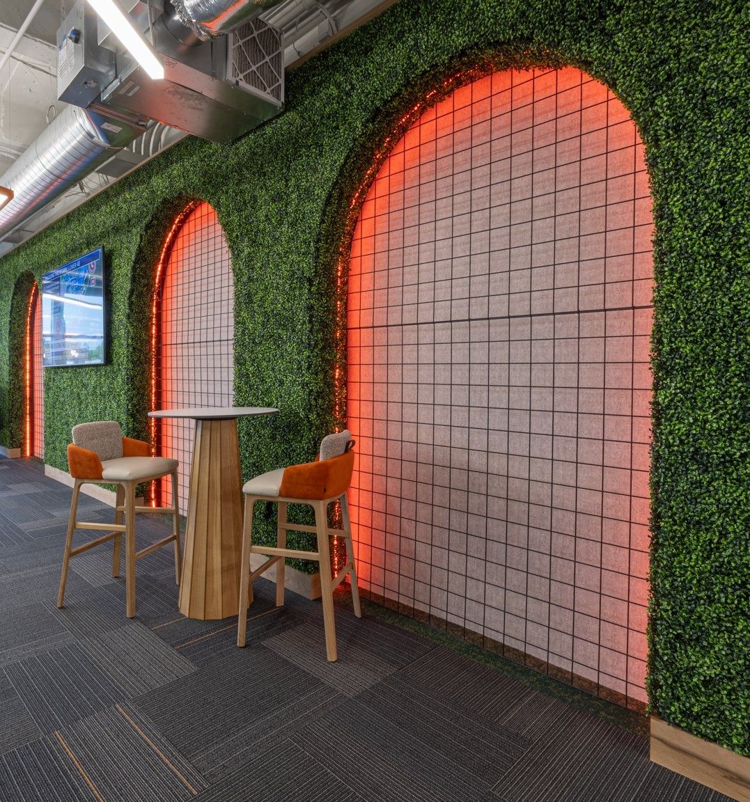 The Home Depot: Booths framed by arches of greenery and orange light