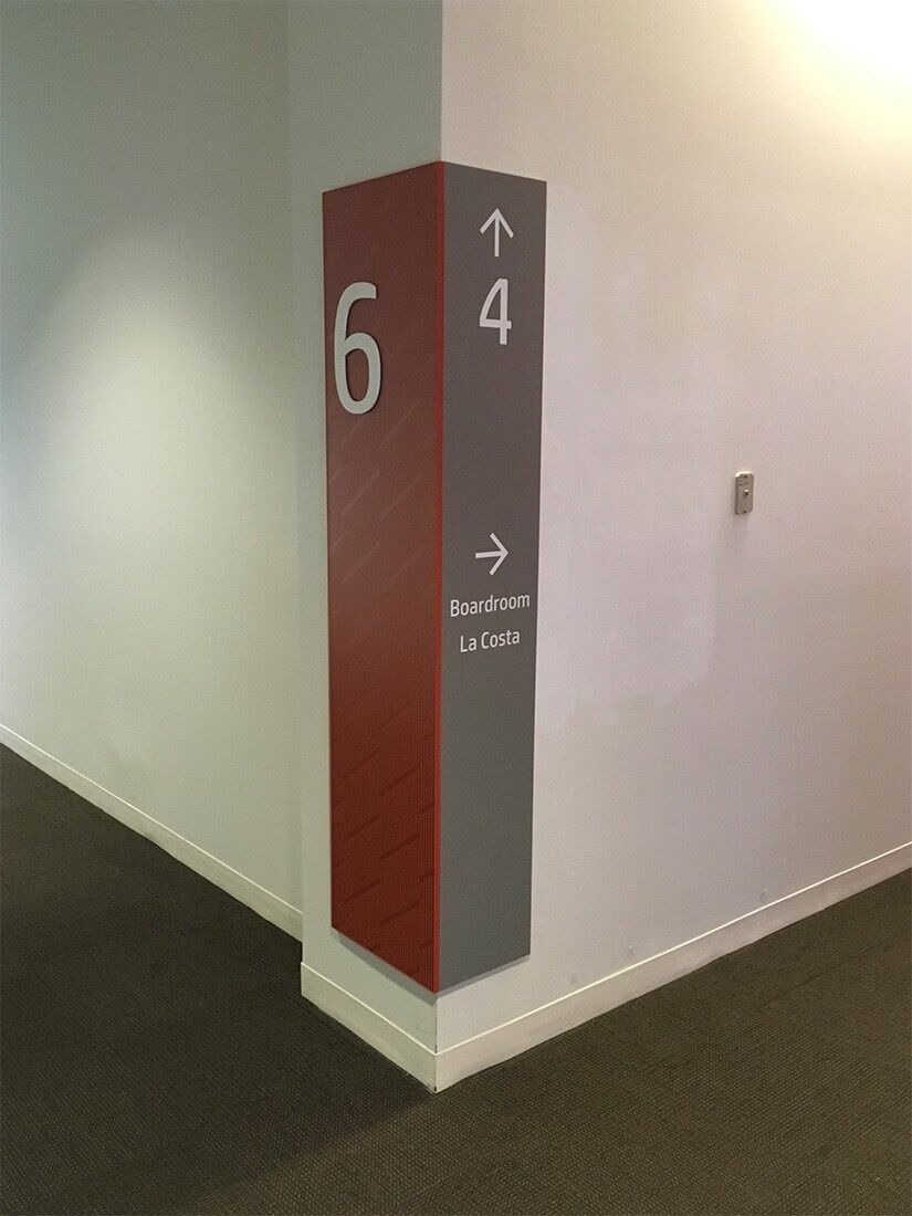 HP Inc.: A red wayfinding column