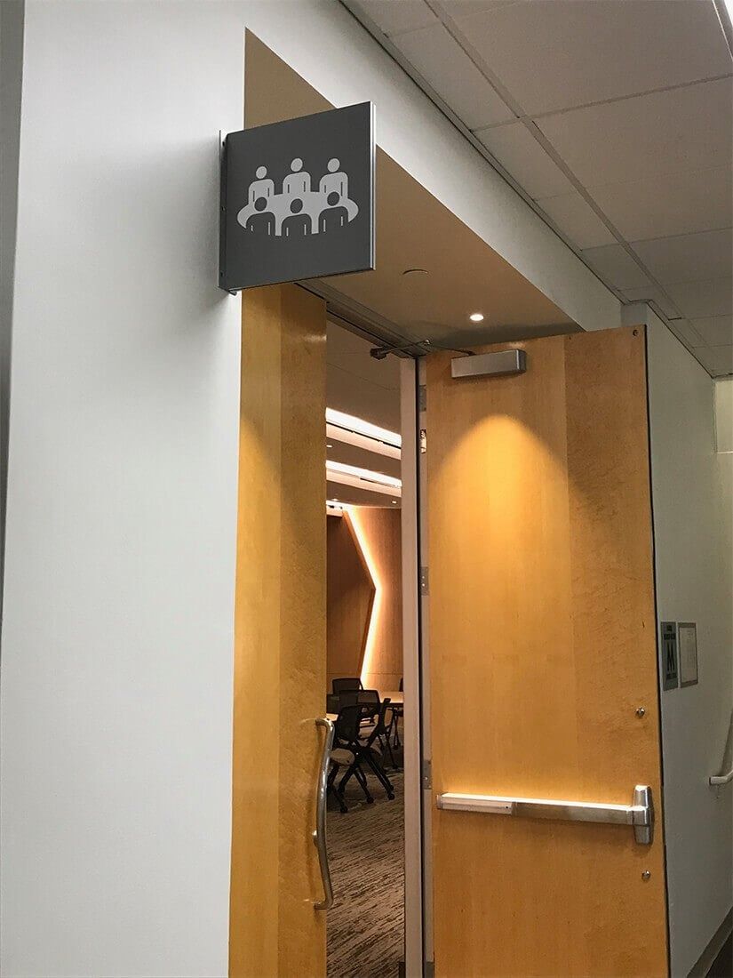 HP Inc.: A wooden door under an icon sign