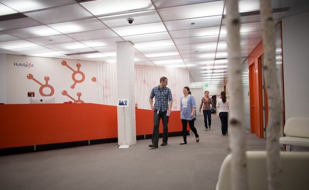 An office corridor with HubSpot logos