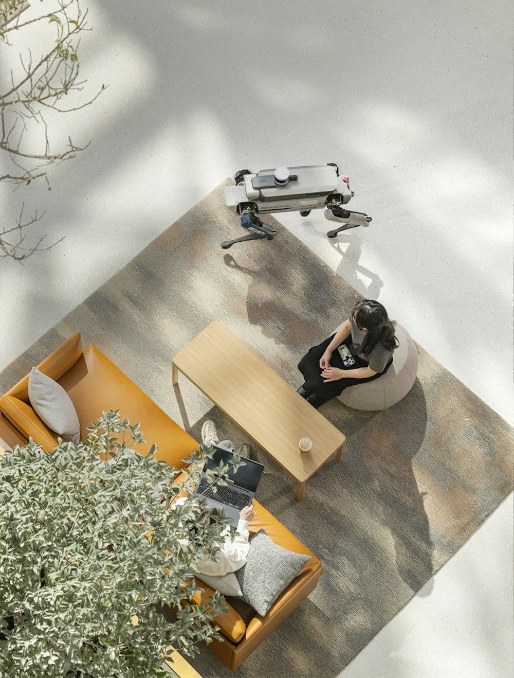 Hyundai Motor Company: Lounge chairs and a robot seen from above