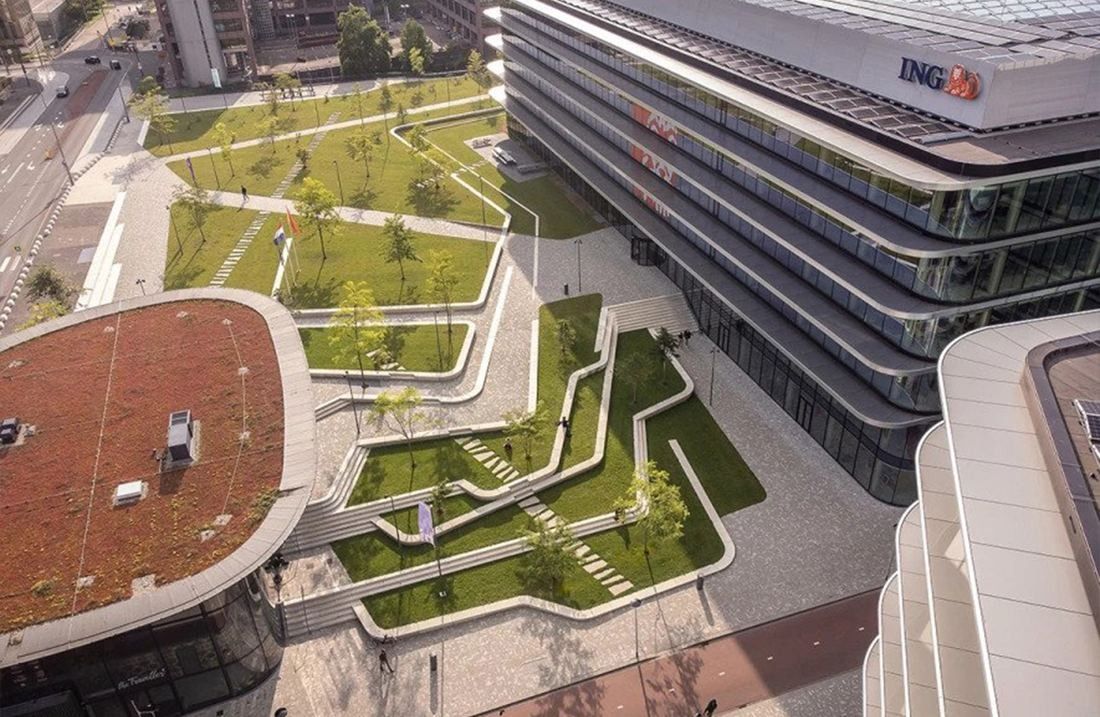 ING Group: Aerial view of stepped green terraces and paths between glass office buildings