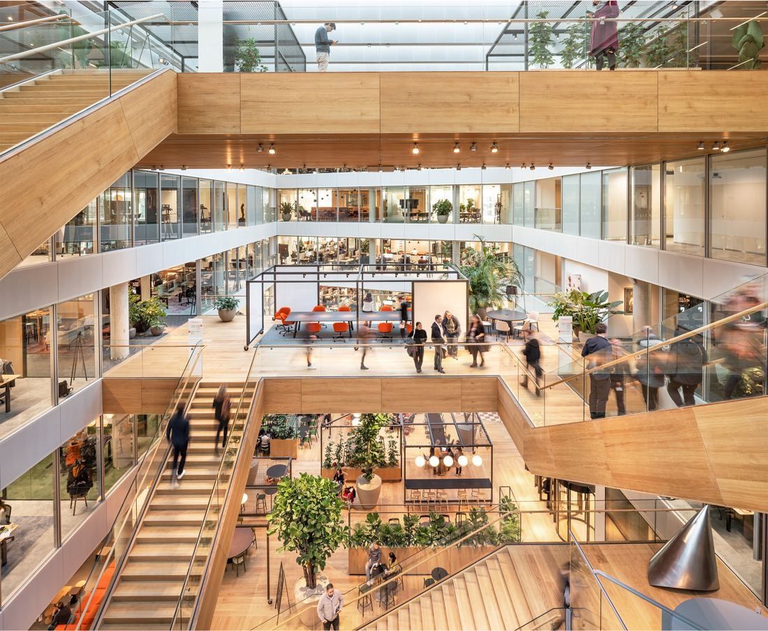 ING Group: Atrium with wooden stairs and floating platforms linking several office floors