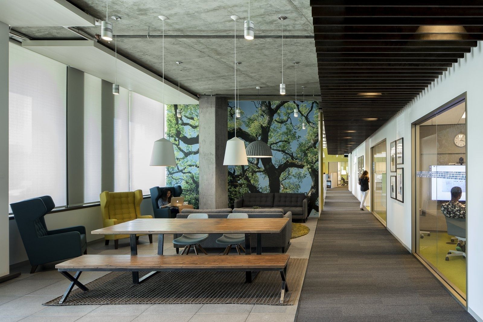 Intuit: A dining area with a large tree mural