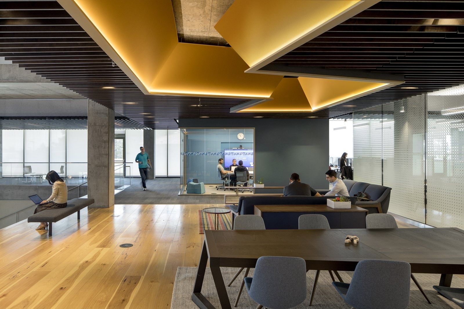 Intuit: A lounge under a bright yellow ceiling