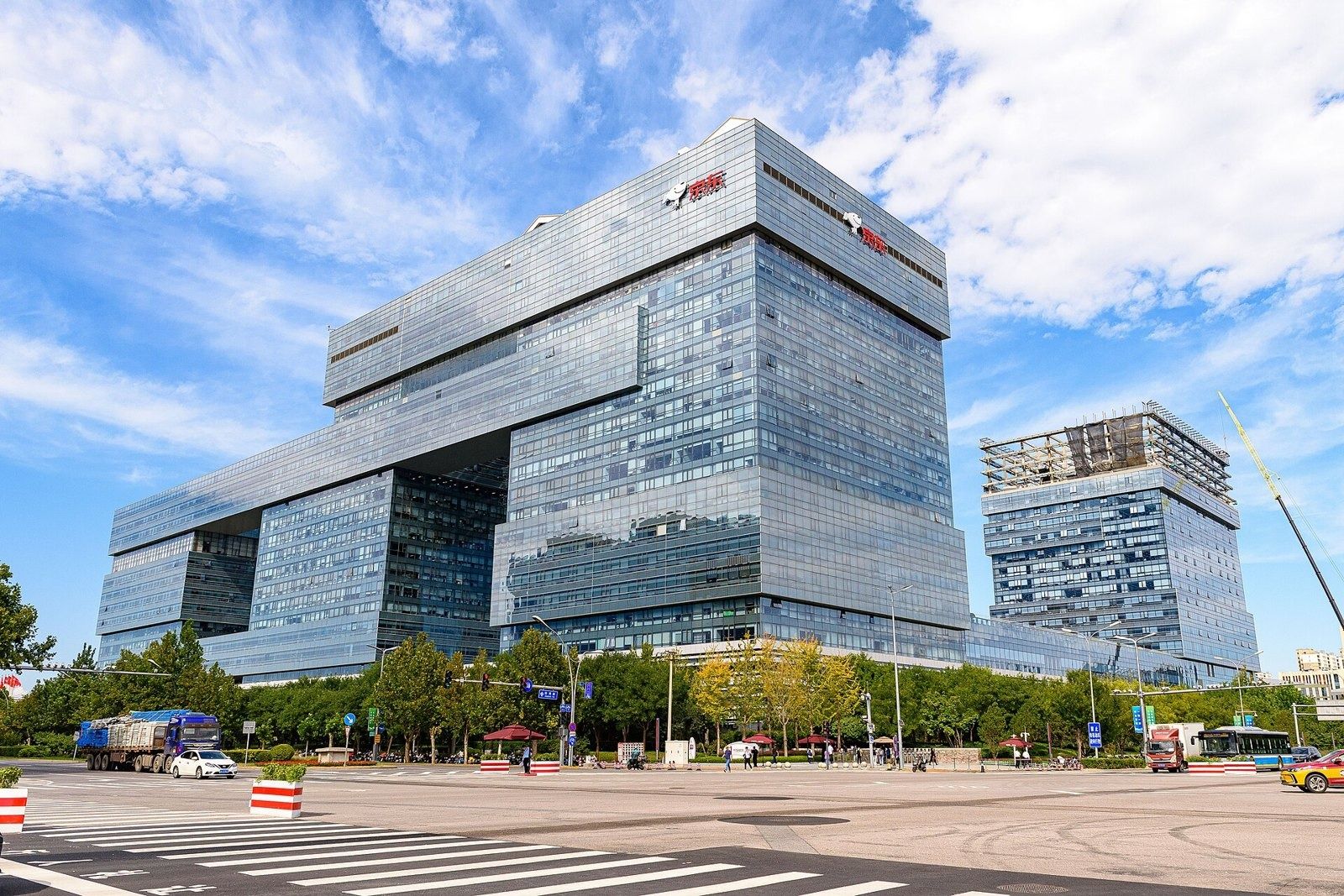 JD.com: Glass headquarters tower with an overhanging upper block