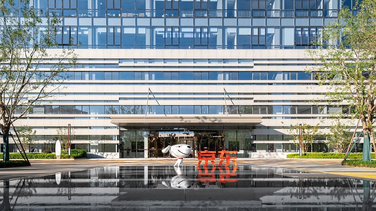 JD.com: Office entrance behind a reflecting pool with a white sculpture