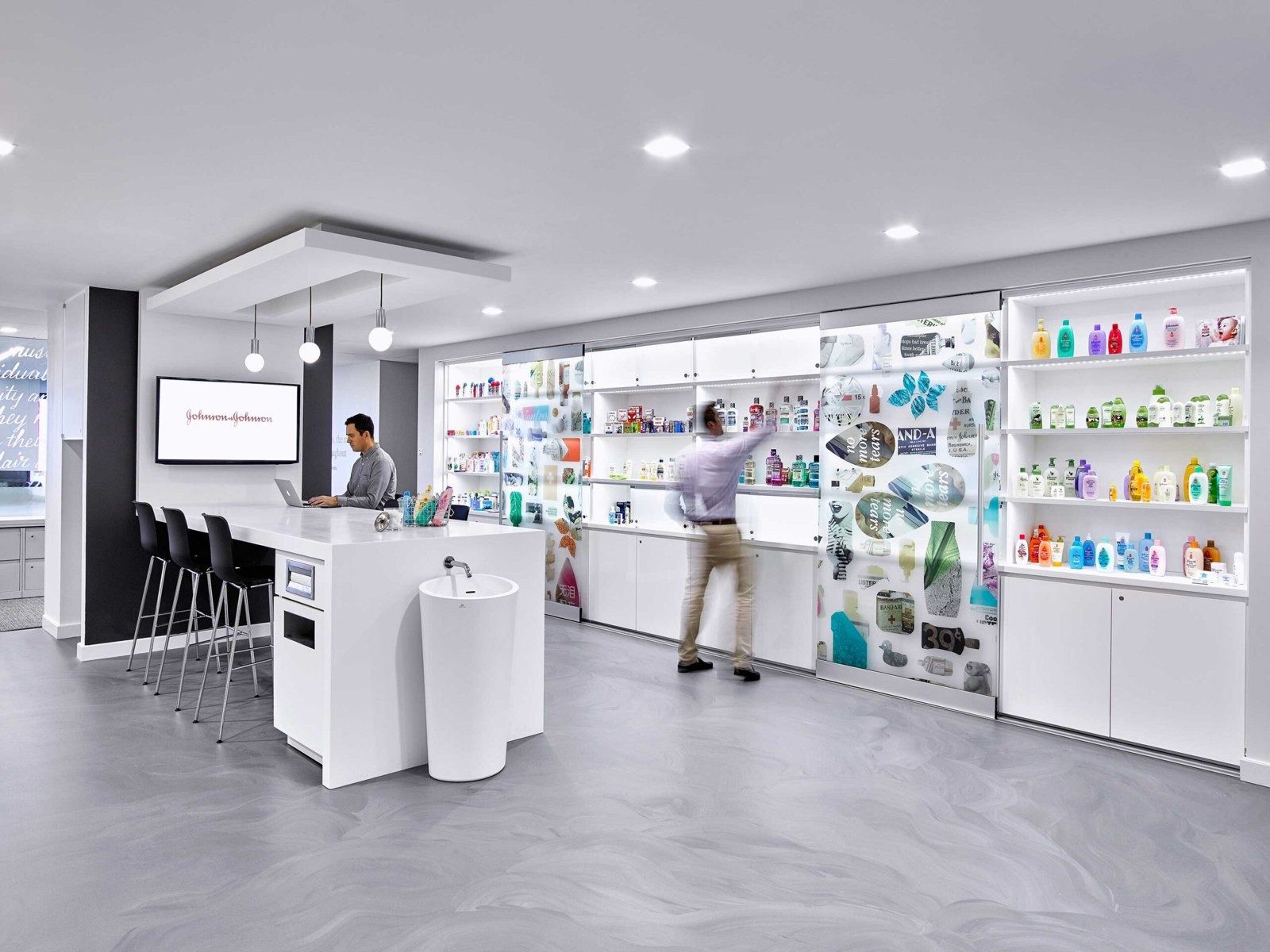 Johnson & Johnson: A product display wall with a bar counter