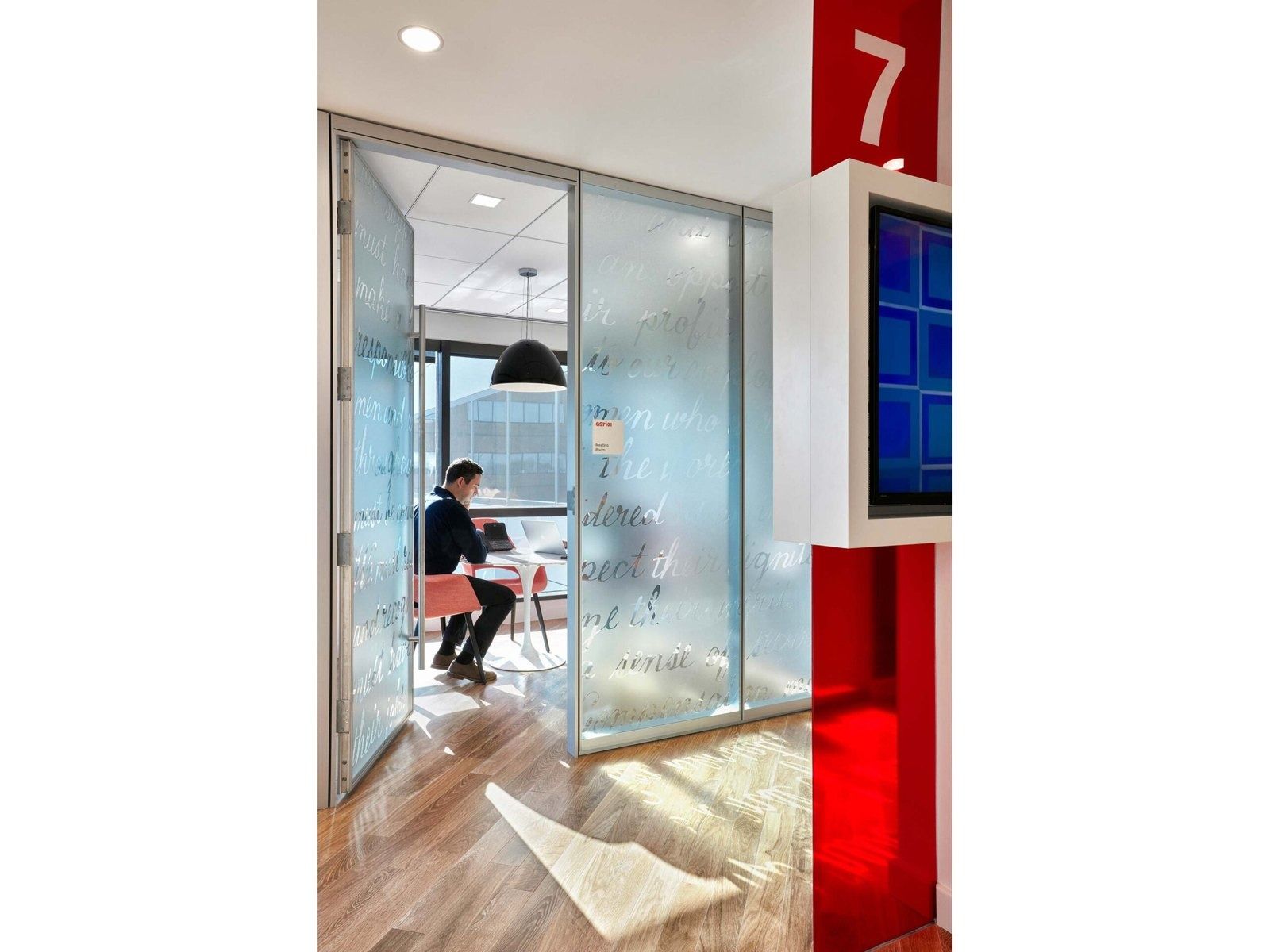 Johnson & Johnson: A small glass meeting room