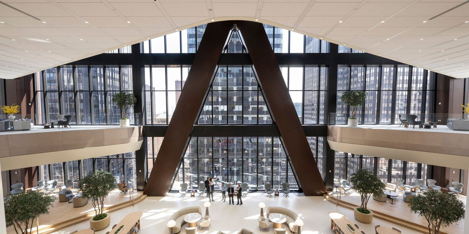 JPMorganChase: A double-height interior with a giant V-shaped column and city views