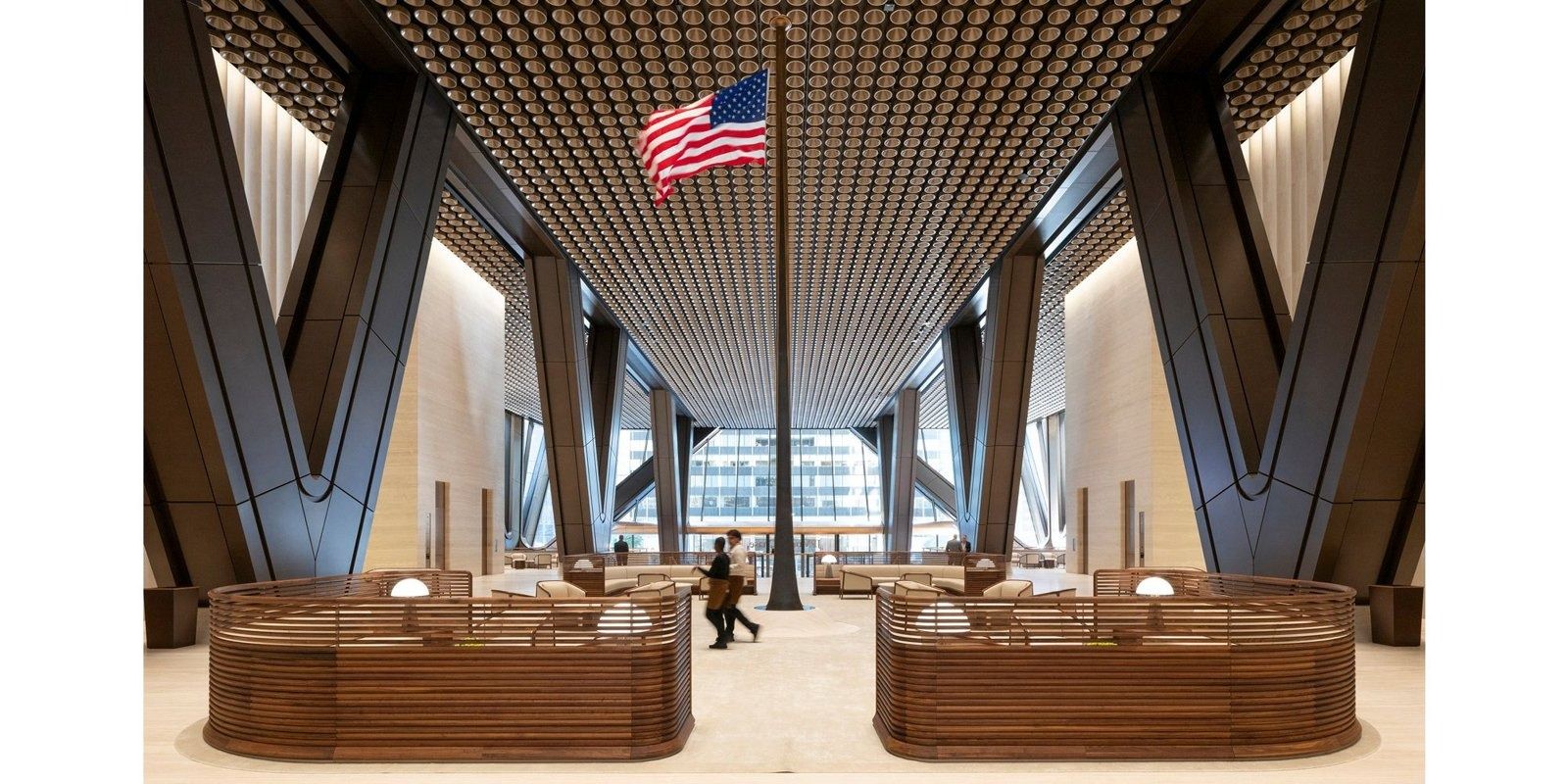 JPMorganChase: A reception desk under a coffered wood ceiling and a U.S. flag
