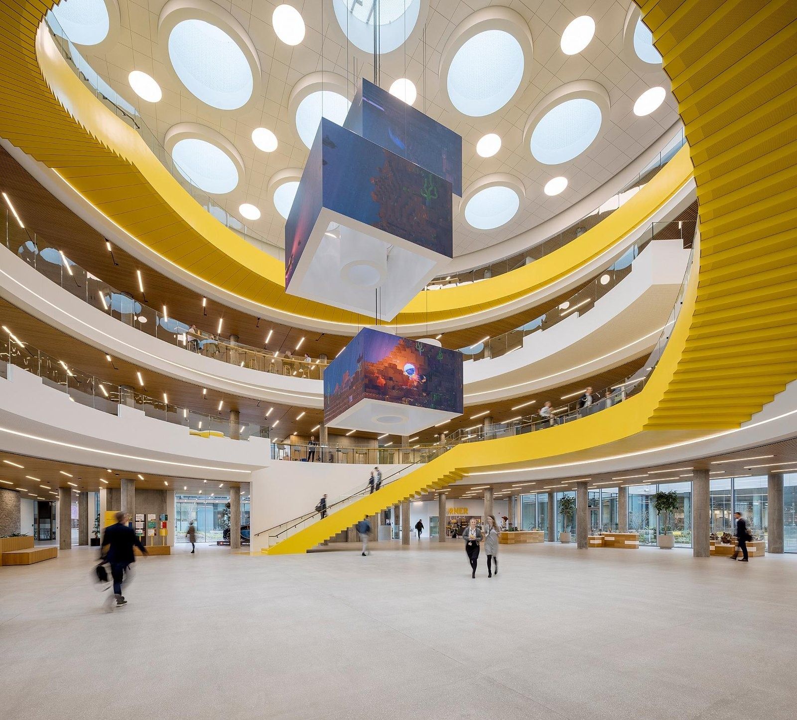 The LEGO Group: Atrium with round skylights and a yellow ramp