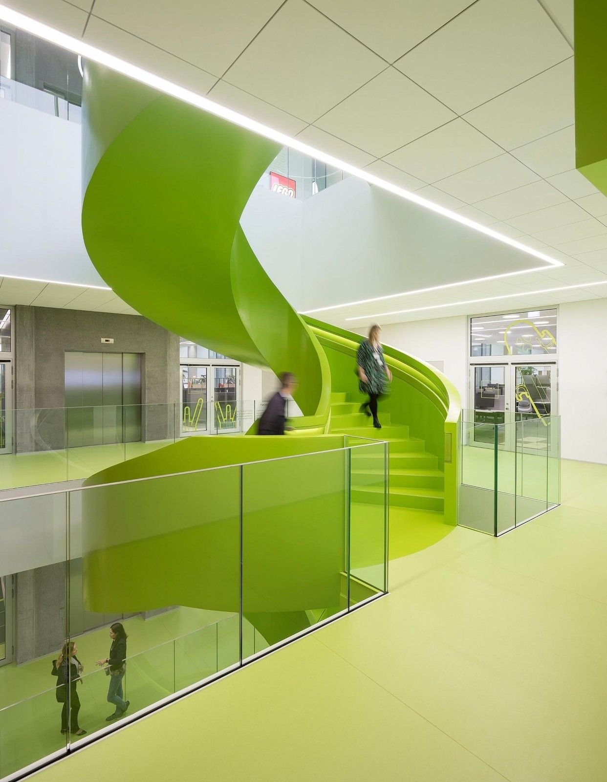 The LEGO Group: Bright green spiral staircase between floors