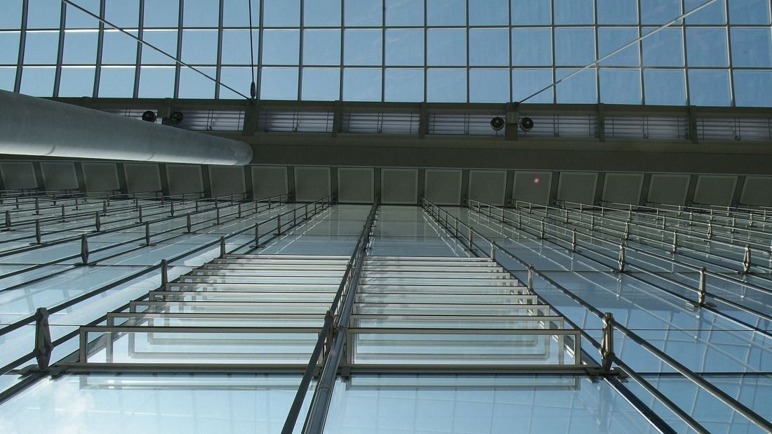 Lufthansa Group: Looking up at a glazed roof with rows of glass panels