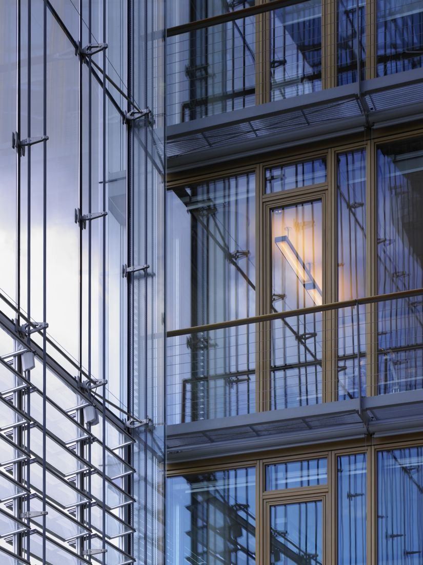 Lufthansa Group: Multi-storey glass facade with balconies inside an atrium