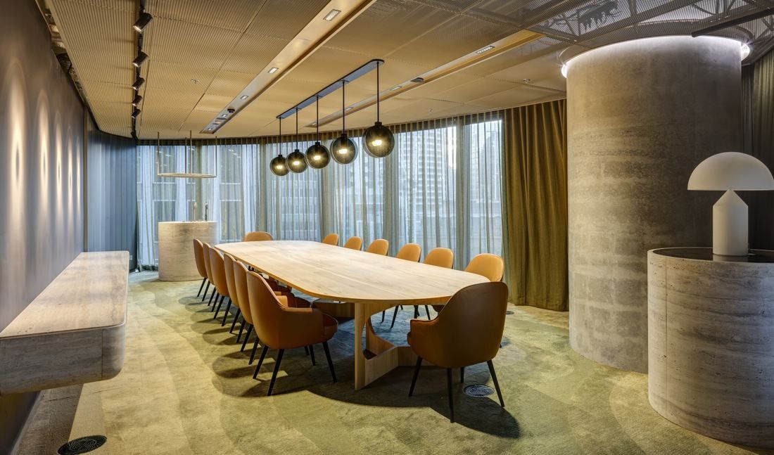 Macquarie Group: Long timber boardroom table with leather chairs and window wall