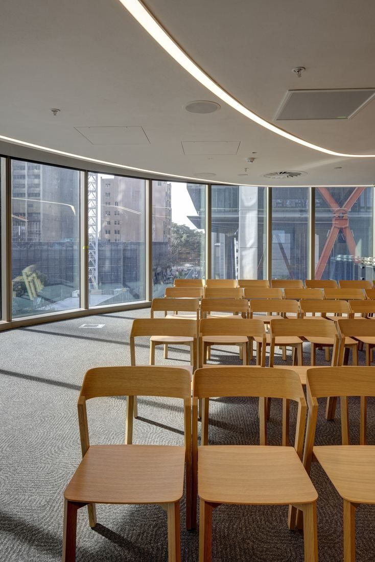 Macquarie Group: Rows of timber chairs facing city windows
