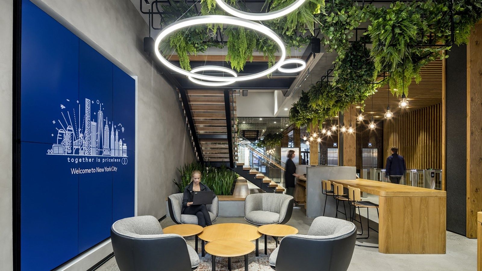 Mastercard: A lounge under ring lights and hanging plants