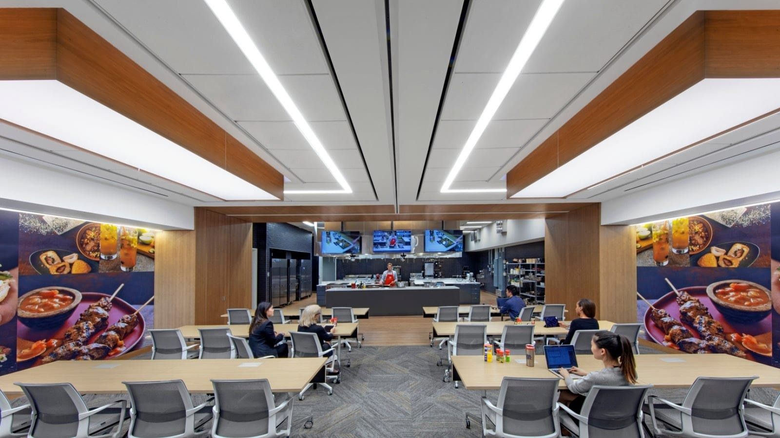 McCormick: Open area with long tables and large food photographs