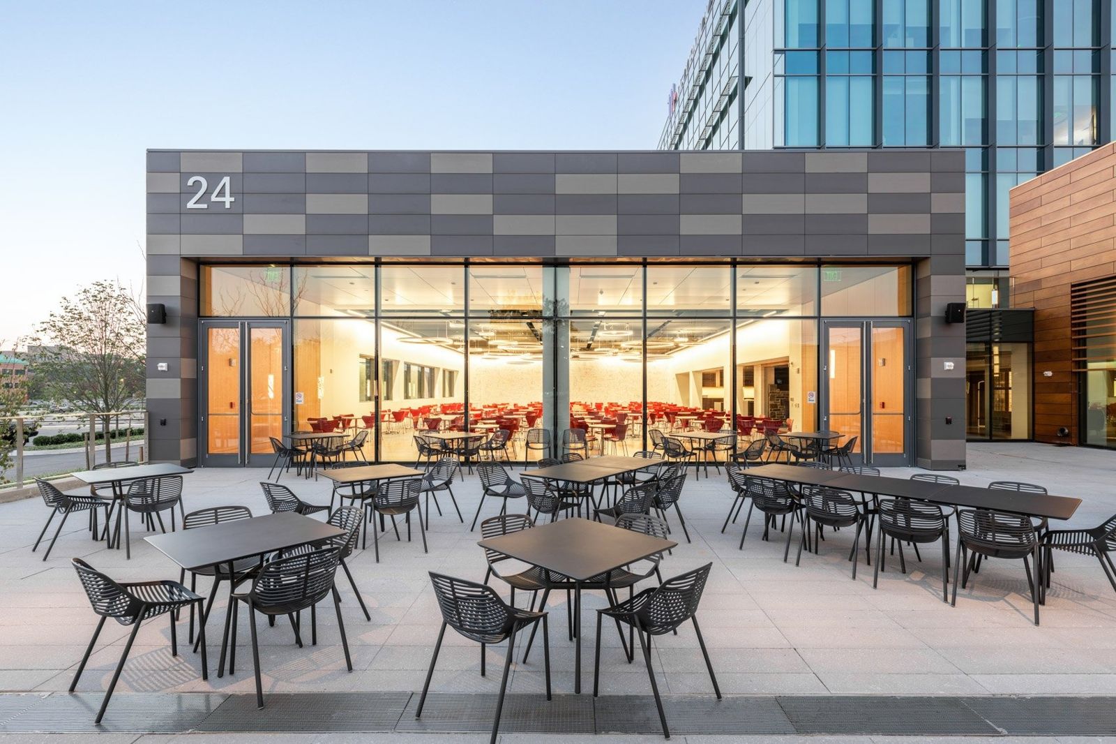 McCormick: Outdoor tables in front of a glass dining room