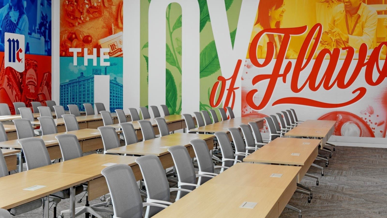 McCormick: Rows of desks in front of a Joy of Flavor mural