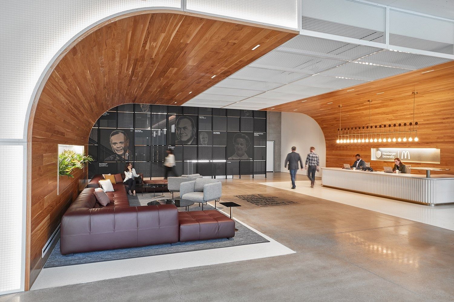 McDonald's: Reception lounge framed by a large curved timber arch
