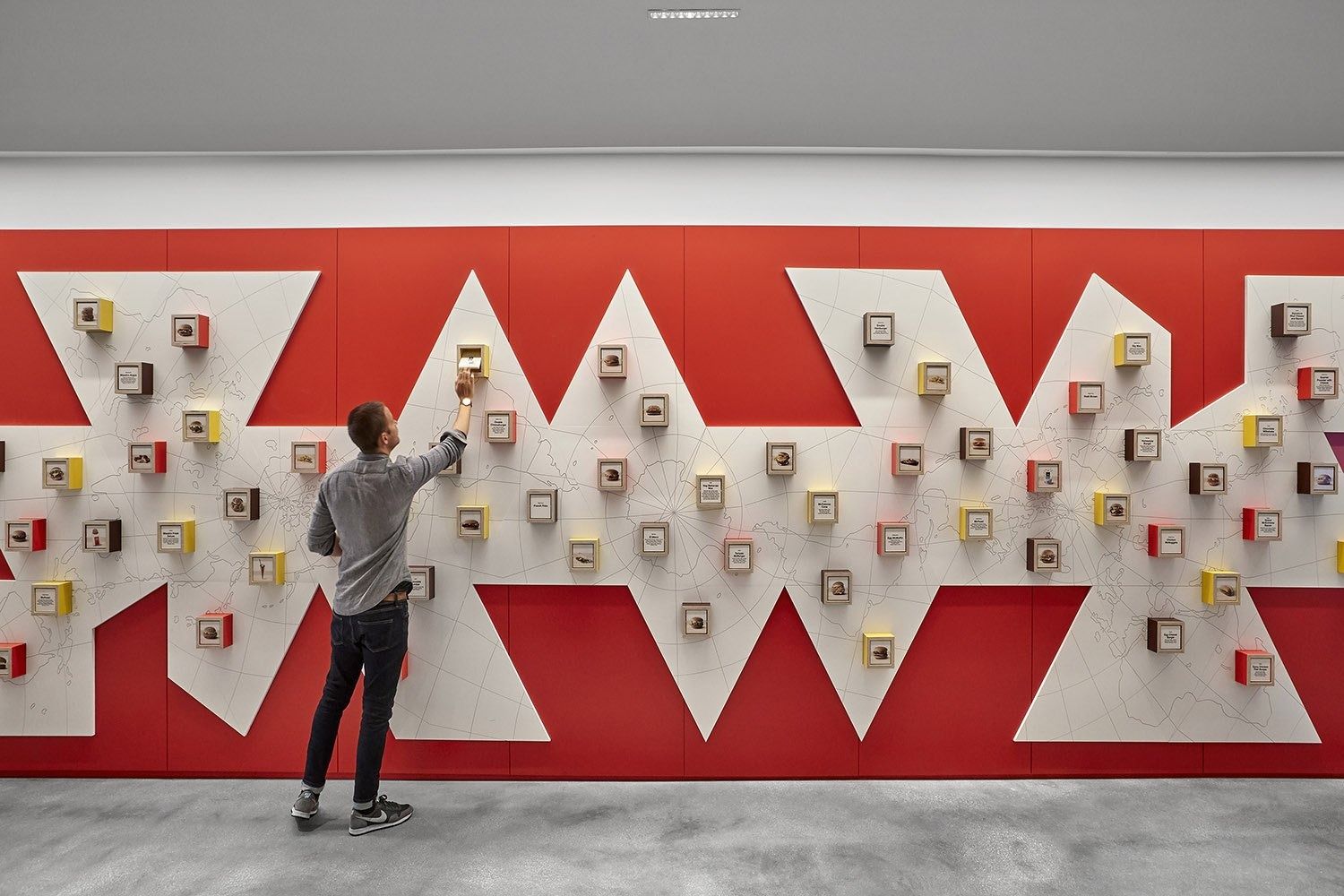 McDonald's: Red graphic wall with toy display boxes