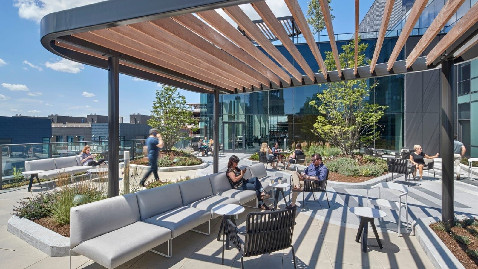McDonald's: Roof terrace with a timber pergola and lounge seating