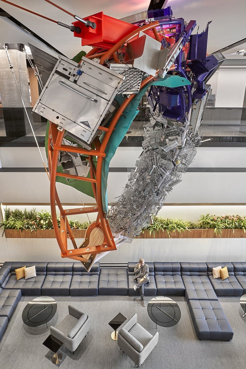 McDonald's: Sculpture made of colourful kitchen parts hanging in the atrium