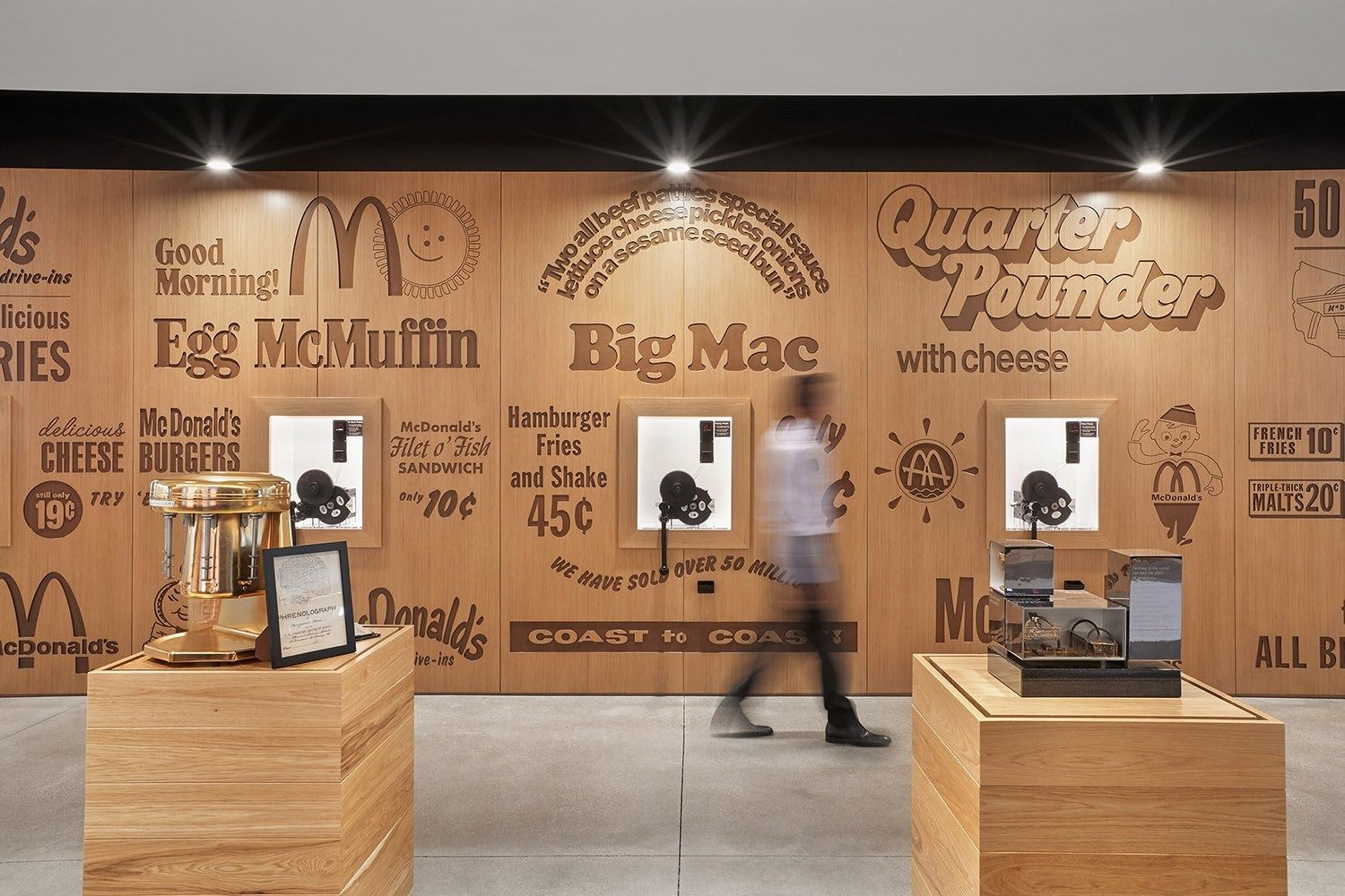 McDonald's: Wall lettered with menu names above display counters