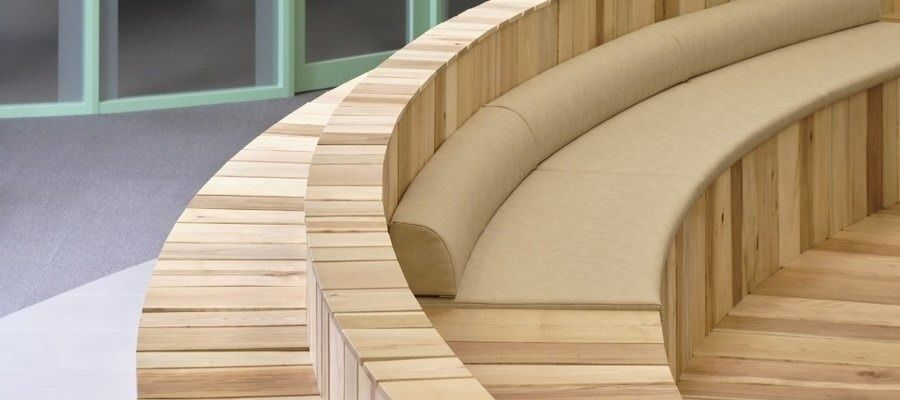 Mercari: Curved wooden bleacher seating with cushions