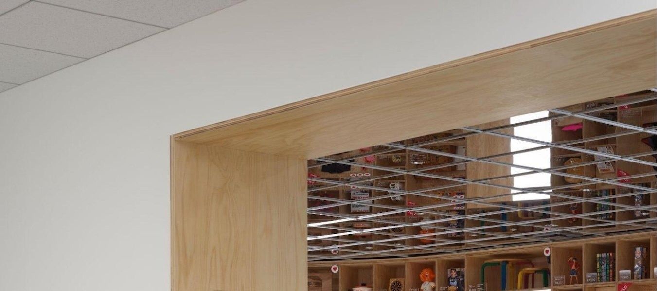 Mercari: Wooden frame around an opening onto shelves