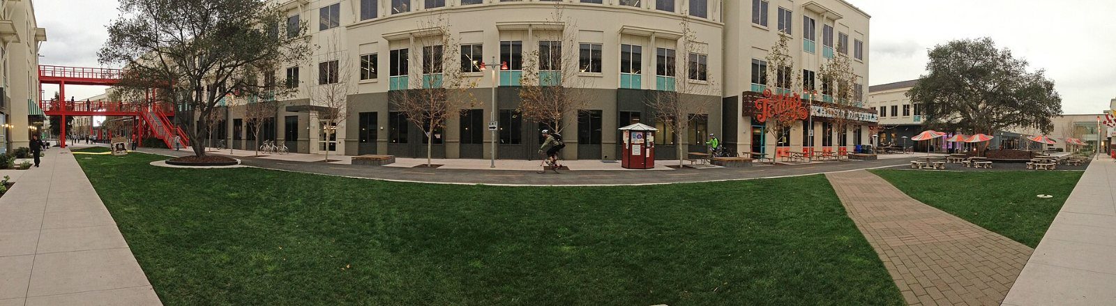 Meta: Wide view of a lawn surrounded by buildings