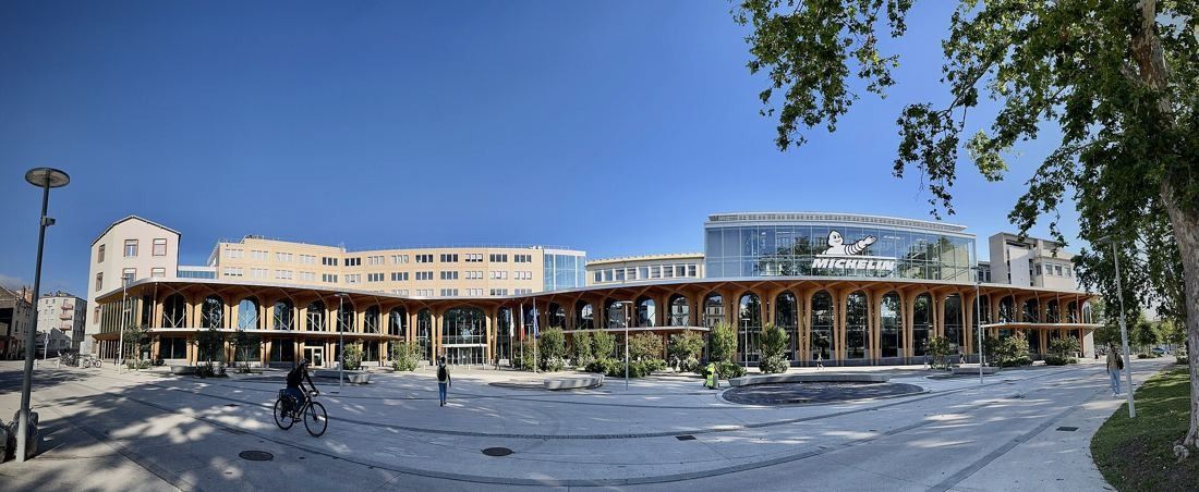 Michelin: Panoramic view of a broad public square with the headquarters buildings behind