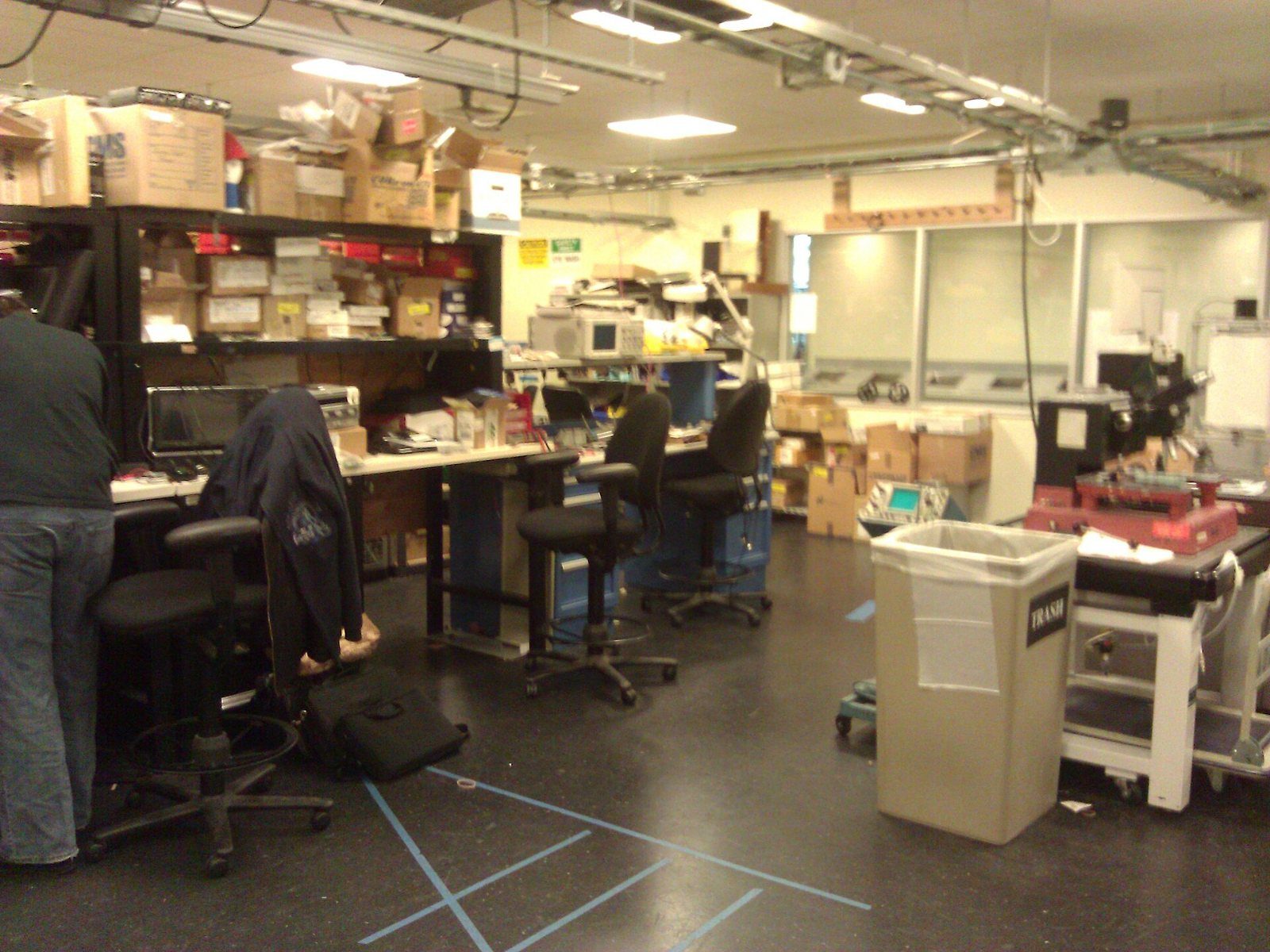 Lab benches with equipment and boxes