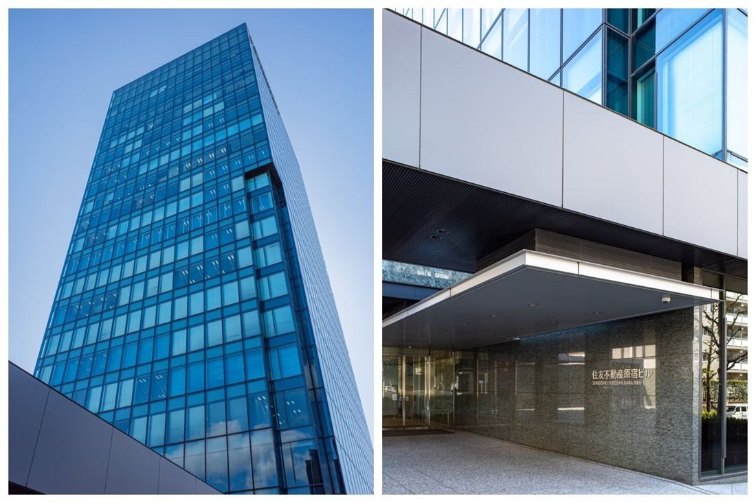 Blue glass office building and its entrance canopy