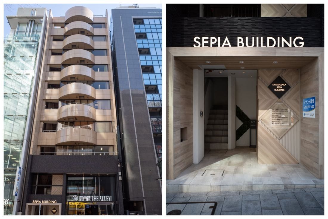 Narrow building with semicircular balconies and its entrance sign