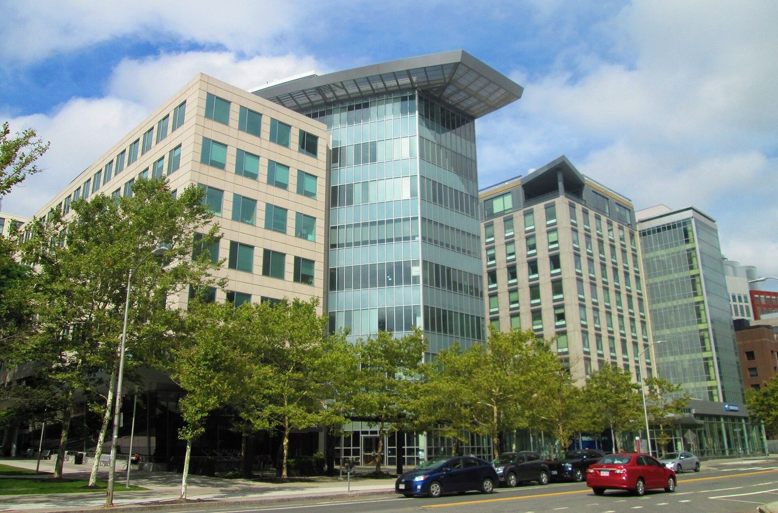 Office buildings of Technology Square behind street trees