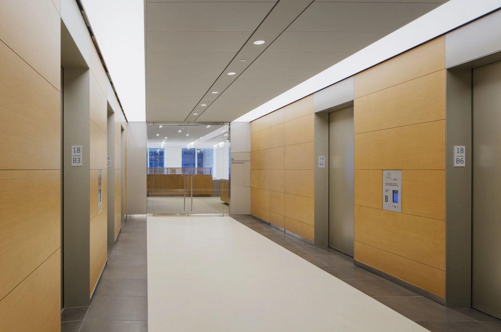 Morgan Stanley: Elevator lobby with wood panelling