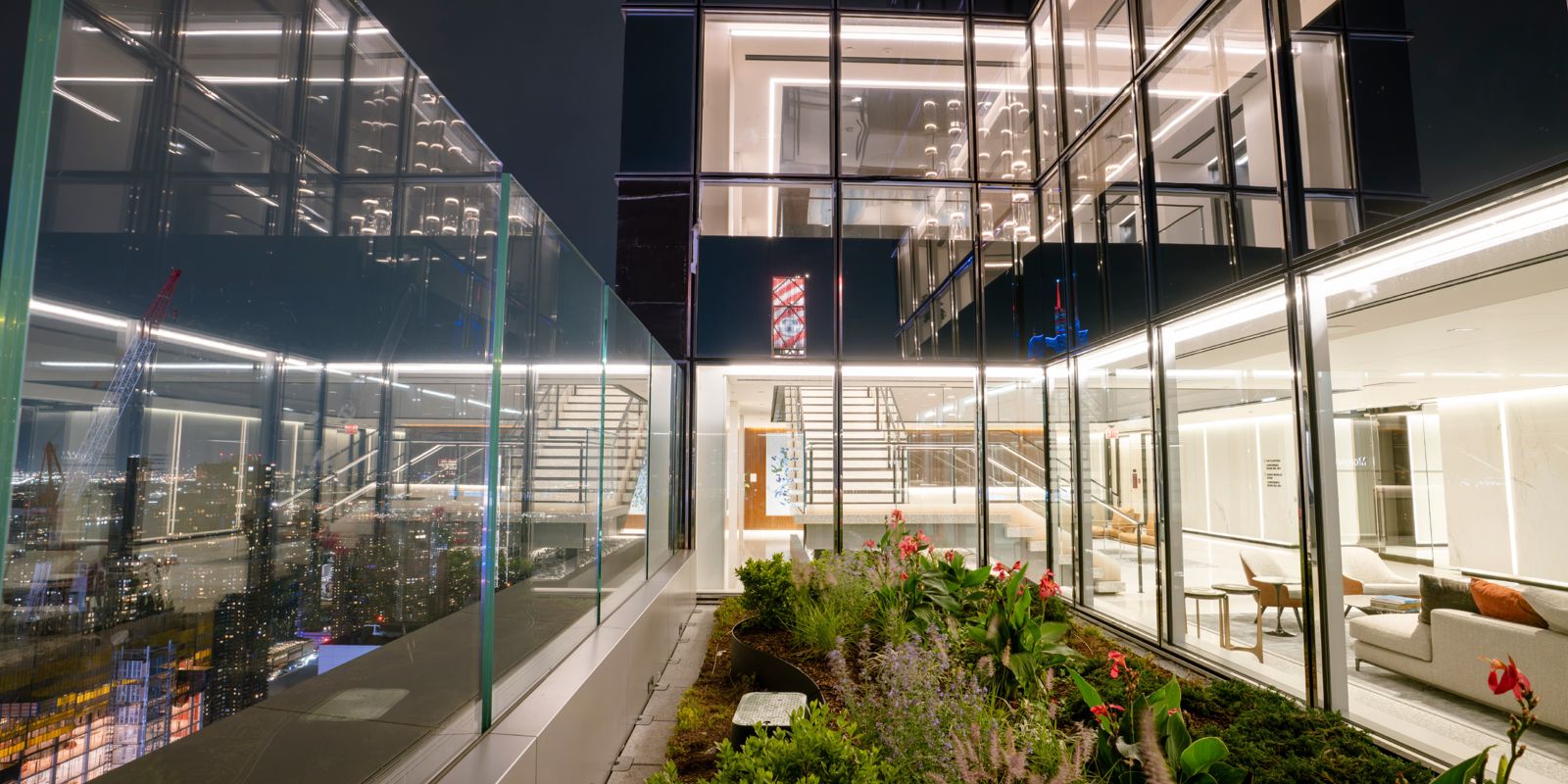 Morgan Stanley: Glass-walled room opening onto a planted terrace