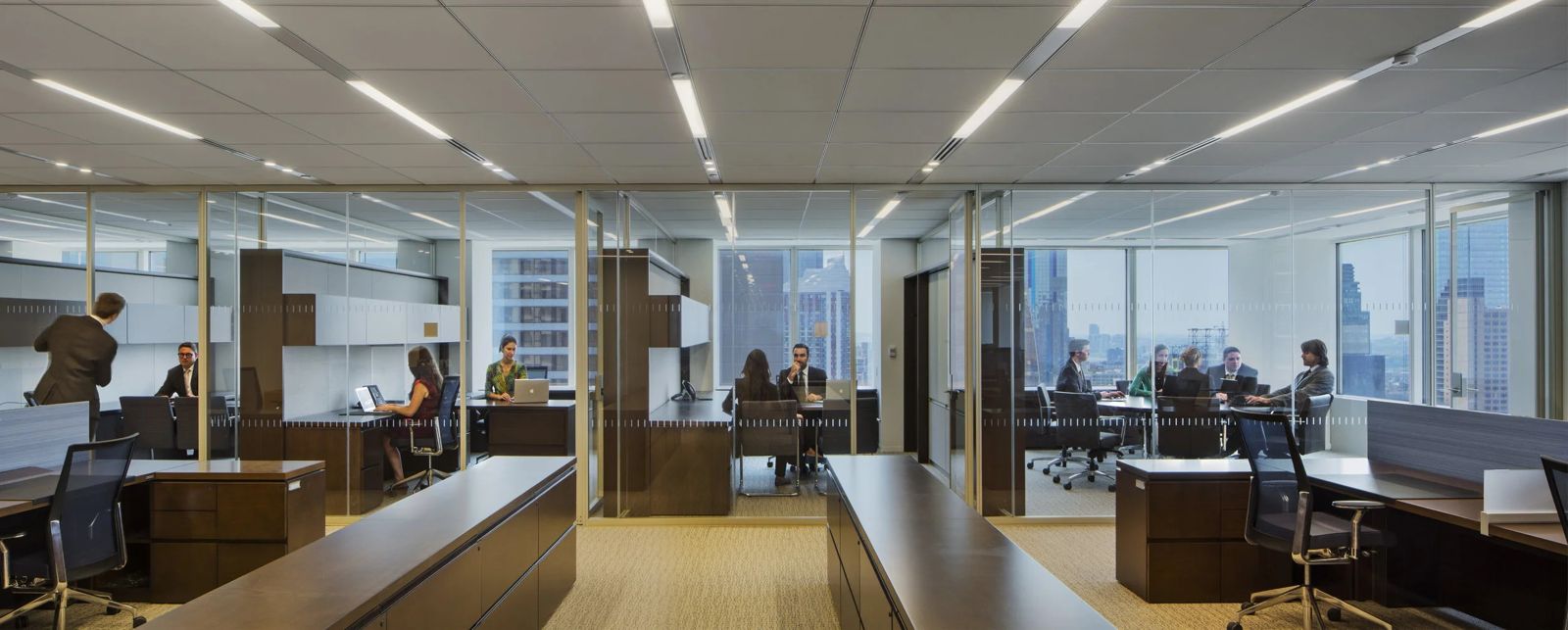 Morgan Stanley: Open office floor with glass-fronted offices and city views