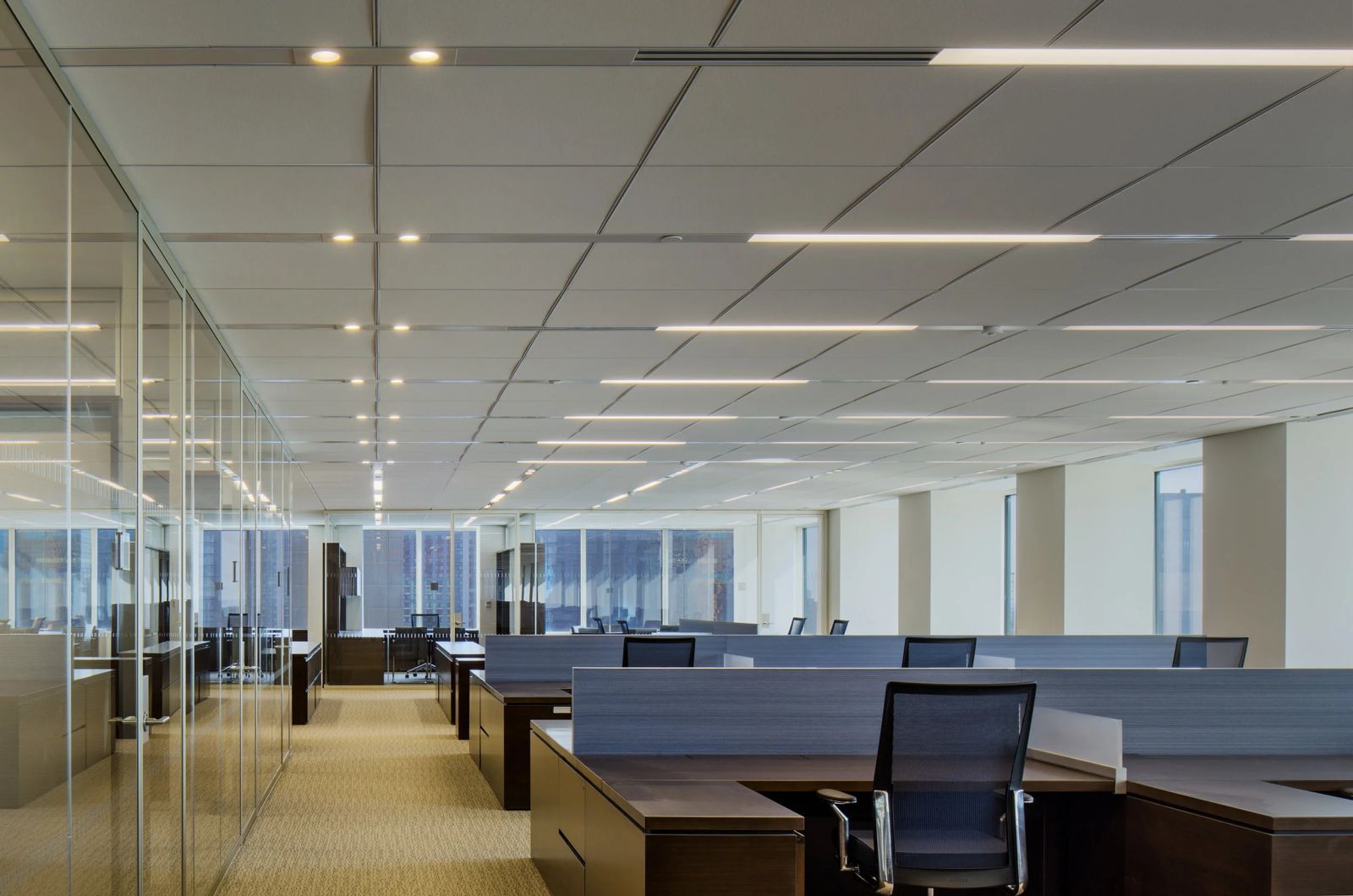 Morgan Stanley: Open-plan floor with rows of desks along the windows