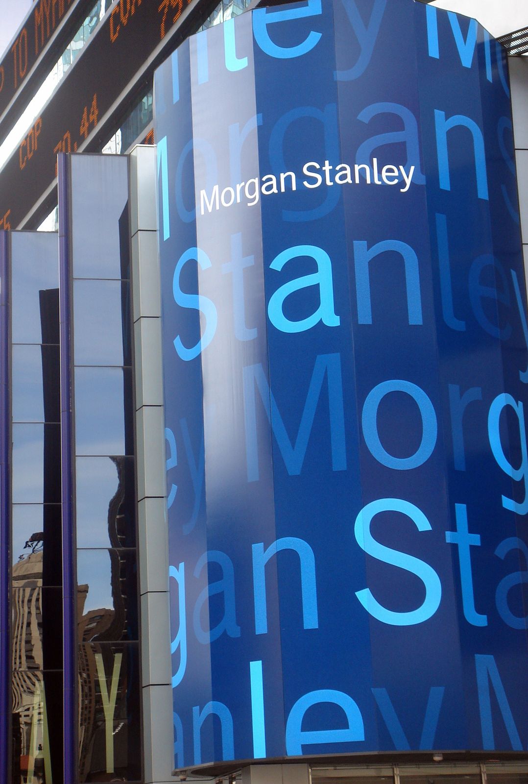 Morgan Stanley: Round blue LED sign at the corner of the building