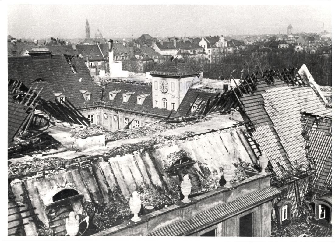 Black-and-white photo of bomb-damaged roofs