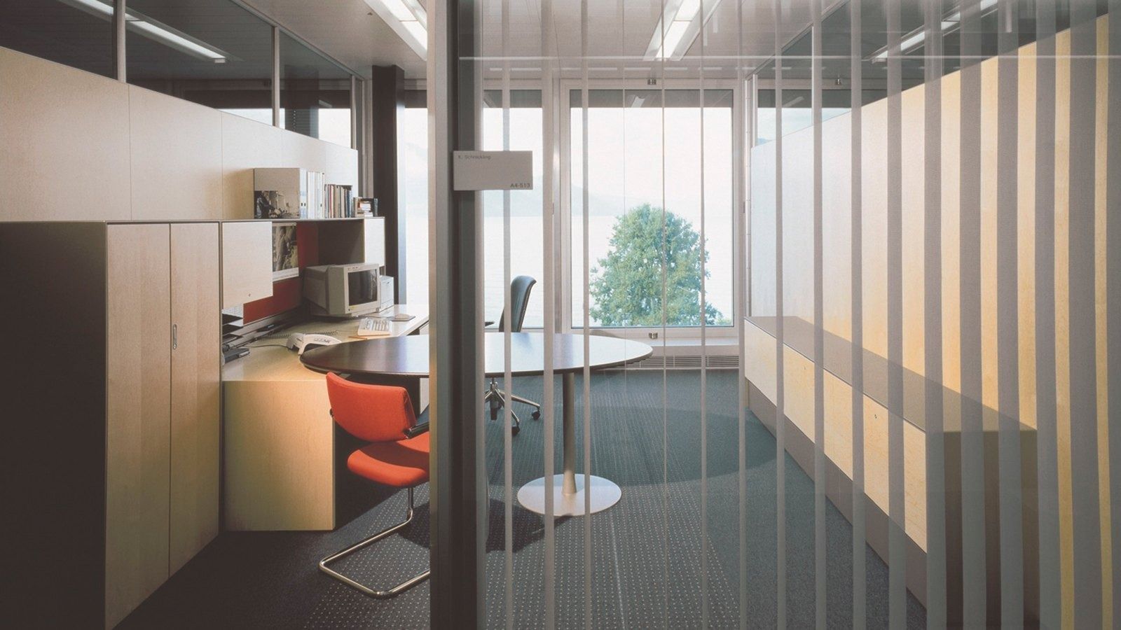 Nestlé: An office with timber screens and a lake view