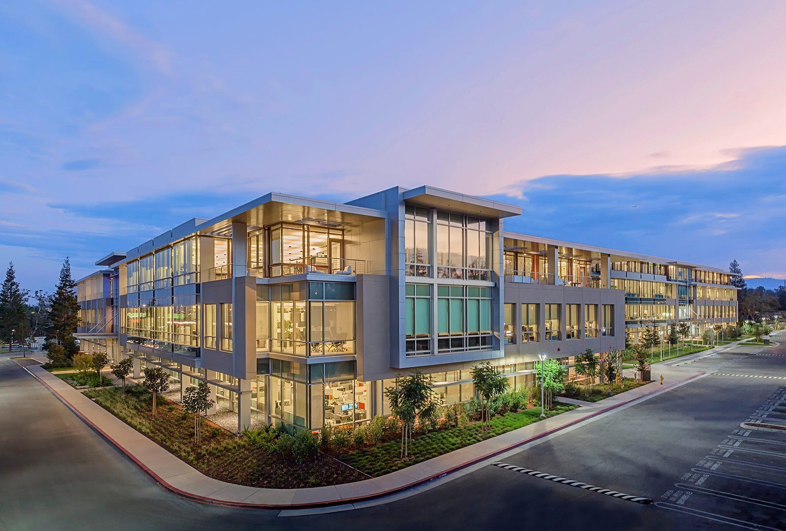 Netflix: Three-storey glass building at dusk