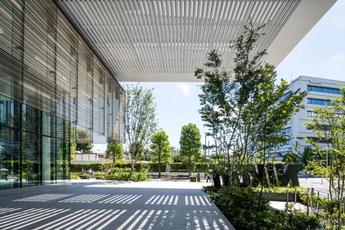 Nikon: Covered walkway with louvered canopy and planting