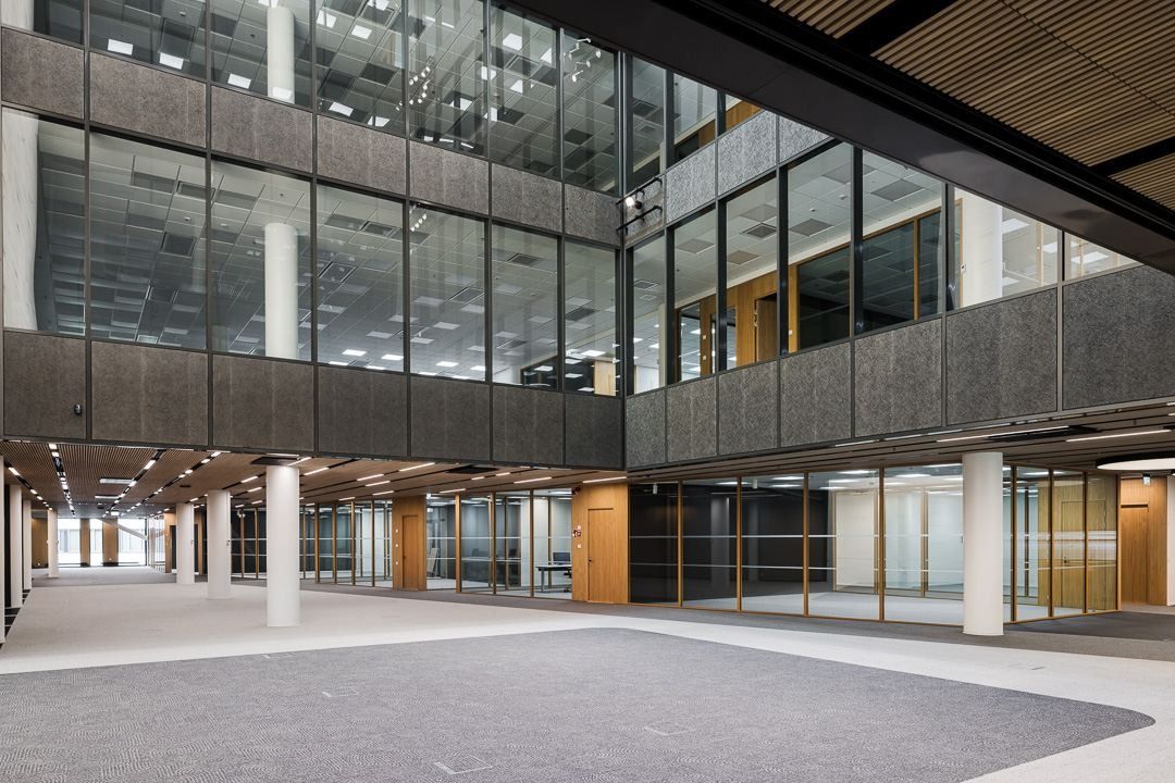 Nordea: Tall atrium with glass walls overlooking an open ground floor