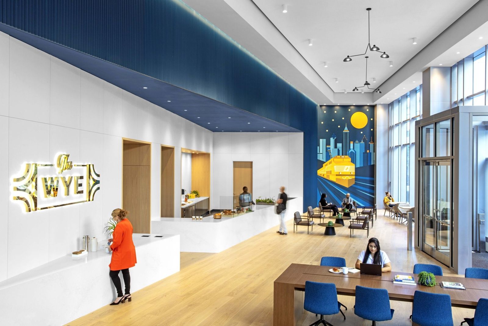 Norfolk Southern: A café counter with a sign reading The Wye and a train mural
