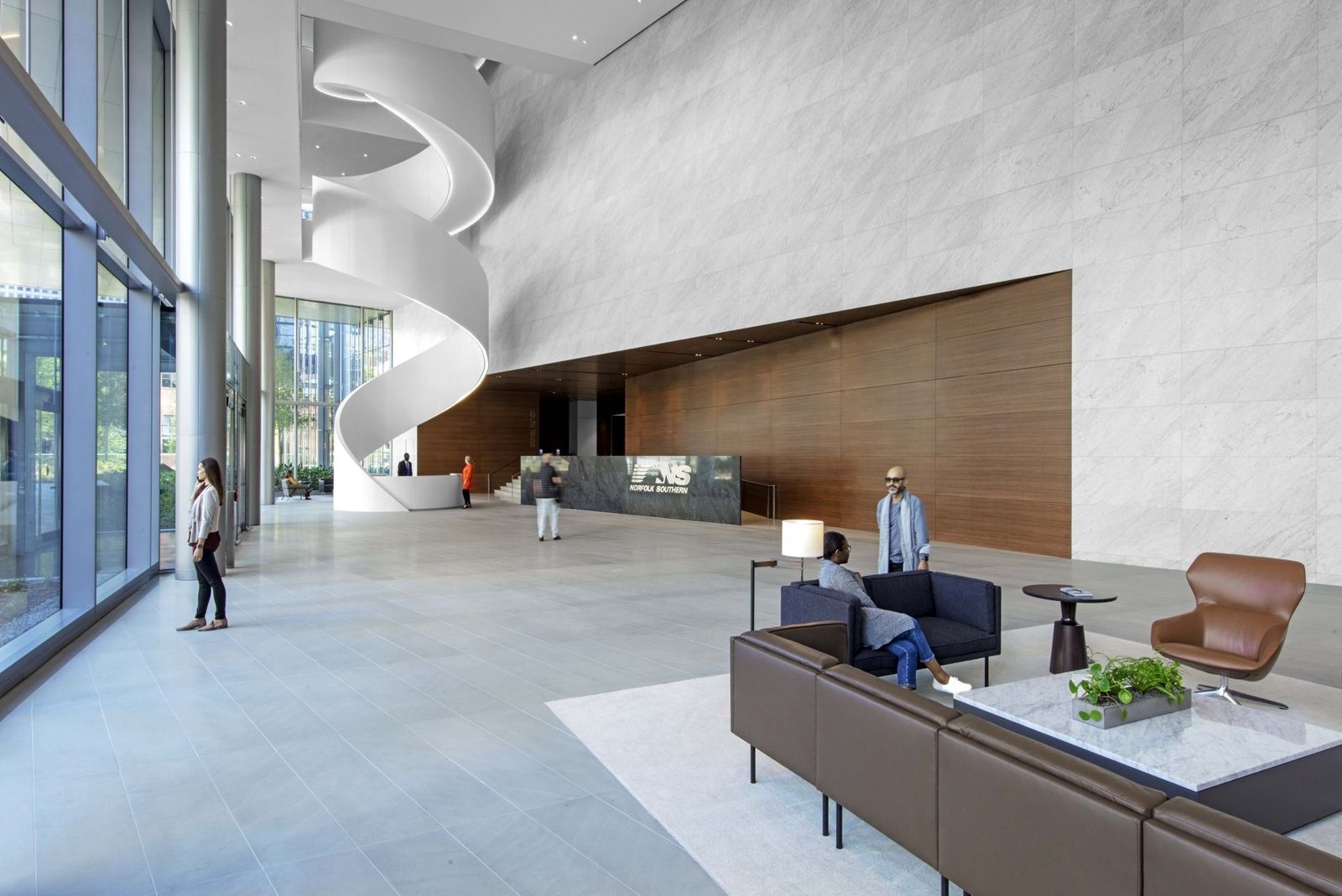 Norfolk Southern: A tall lobby with sofas and the white stair behind
